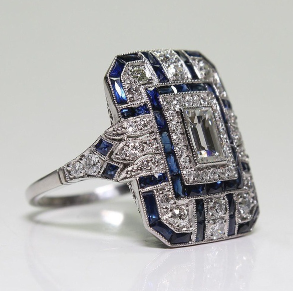 Vintage-Ring aus poliertem Silber mit blauem Zirkon